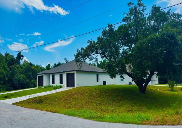 2nd image of 15506 Chamberlain Blvd, Port Charlotte, FL 33953 | MLS# O6402252