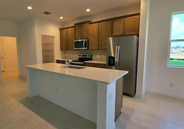 2nd image of 2142 Town Pasture Dr, Eustis, FL 32726 | MLS# O6408533