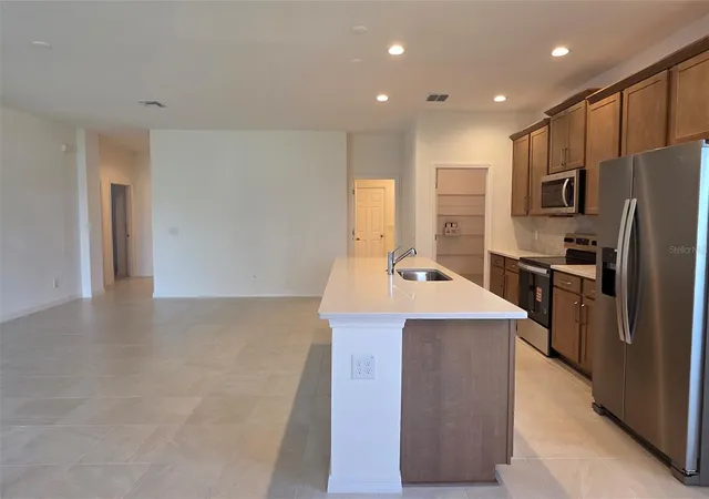 4th image of 2142 Town Pasture Dr, Eustis, FL 32726 | MLS# O6408533