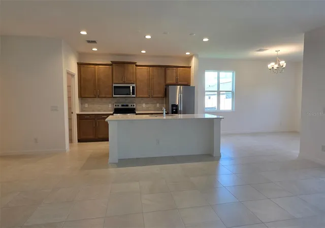 5th image of 2142 Town Pasture Dr, Eustis, FL 32726 | MLS# O6408533