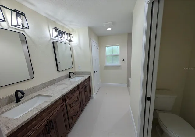 Photo 4 of Single family home for sale at 12397 SW 76th Lane, Dunnellon, FL 34432 | MLS# OM725434 | Listing updated on 2026-09-29
