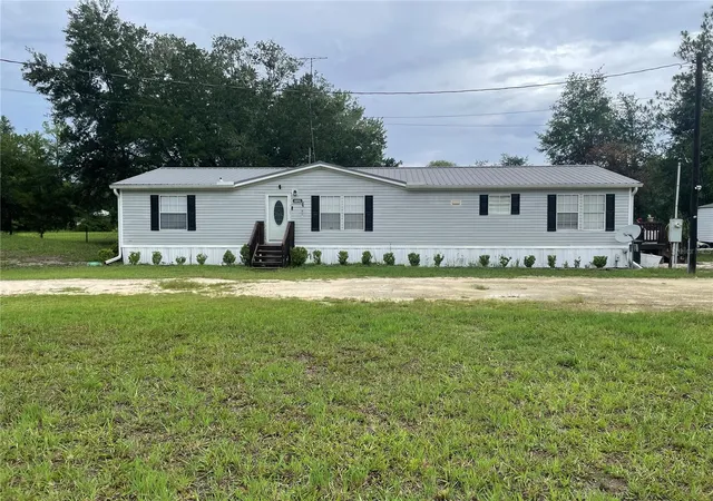 1st image of 8890 Se 66th Cir, Trenton, FL 32693 | MLS# GC541441