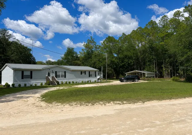 Photo 3 of Manufactured home for sale at 8890 Se 66th Circle, Trenton, FL 32693 | MLS# GC541441 | Listing updated on 2026-09-25
