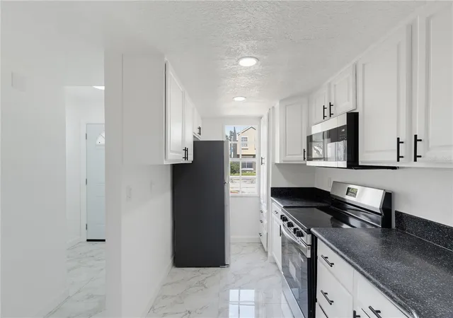 Photo 4 of Townhouse for sale at 6661 121st Avenue #G, Largo, FL 33773 | MLS# TB8524005 | Listing updated on 2026-09-25