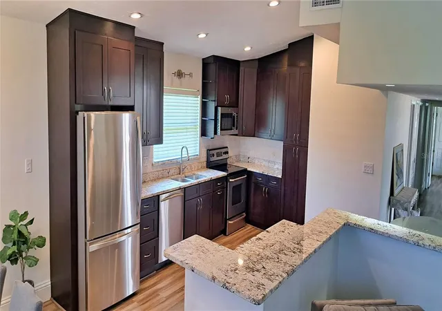 Photo 4 of Single family home for sale at 2400 Lauderdale Ct, Orlando, FL 32805 | MLS# O6421364 | Listing updated on 2026-09-06