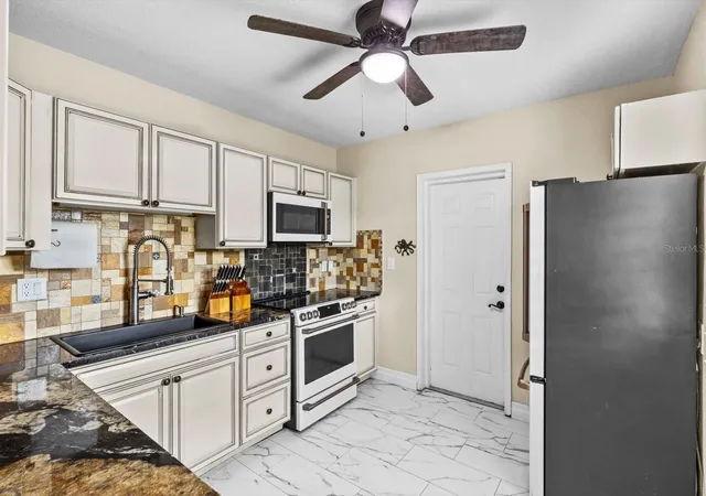 Photo 3 of Single family home for sale at 301 Granada St, Fort Pierce, FL 34949 | MLS# O6421733 | Listing updated on 2026-09-04