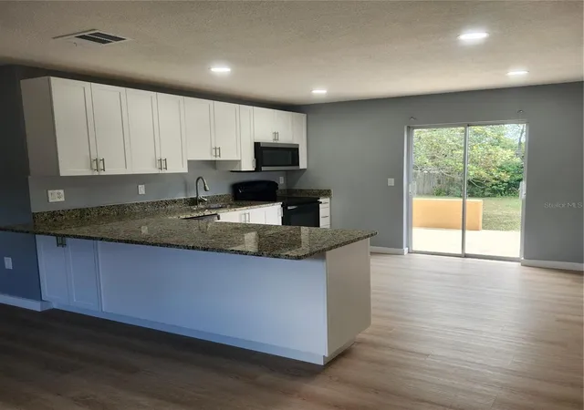 3rd image of 12230 Skyler Ln, Spring Hill, FL 34609 | MLS# TB8526211