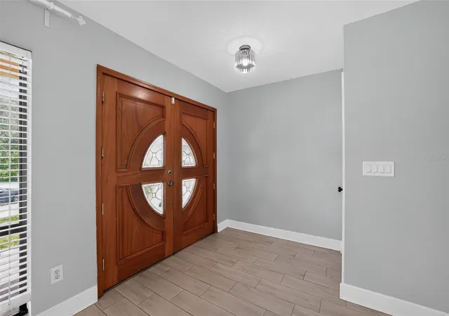Photo 3 of Single family home for sale at 7001 Baywood Ct, Tampa, FL 33615 | MLS# O6422983 | Listing updated on 2026-08-17