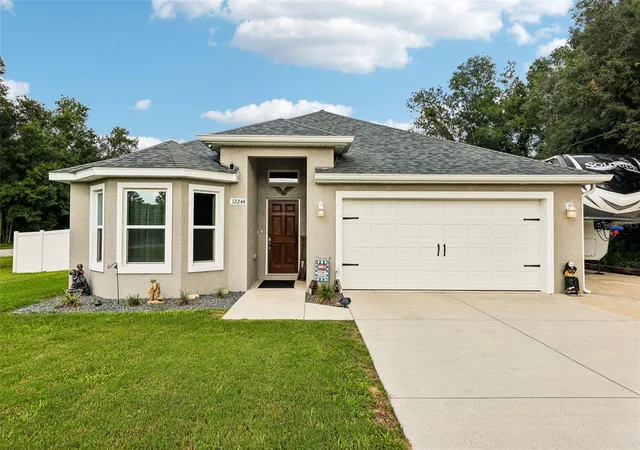 Photo 1 of Single family home for sale at 12244 Se 86th Court, Belleview, FL 34420 | MLS# O6423089 | Listing updated on 2026-09-06