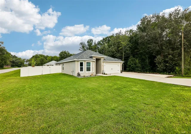 Photo 2 of Single family home for sale at 12244 Se 86th Court, Belleview, FL 34420 | MLS# O6423089 | Listing updated on 2026-09-06
