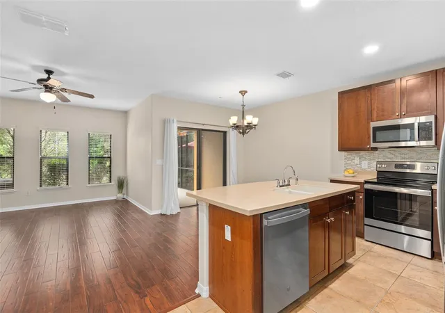 Photo 3 of Townhouse for sale at 6058 Tivoli Gdns Blvd, Orlando, FL 32829 | MLS# S5153569 | Listing updated on 2026-08-21