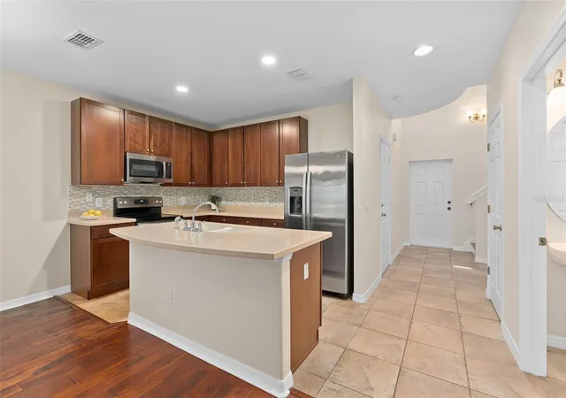 Photo 4 of Townhouse for sale at 6058 Tivoli Gdns Blvd, Orlando, FL 32829 | MLS# S5153569 | Listing updated on 2026-08-21