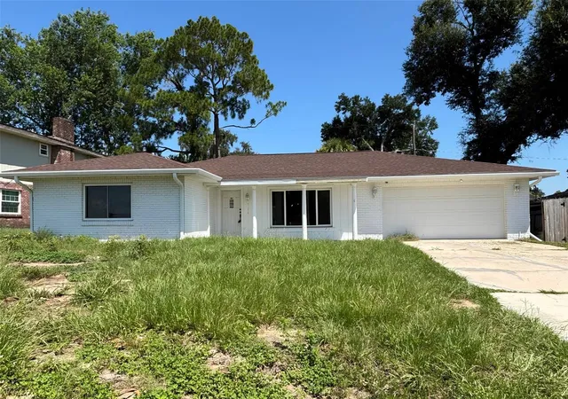 Photo 1 of Single family home for sale at 212 Overlook Dr, Winter Haven, FL 33884 | MLS# O6424548 | Listing updated on 2026-09-24