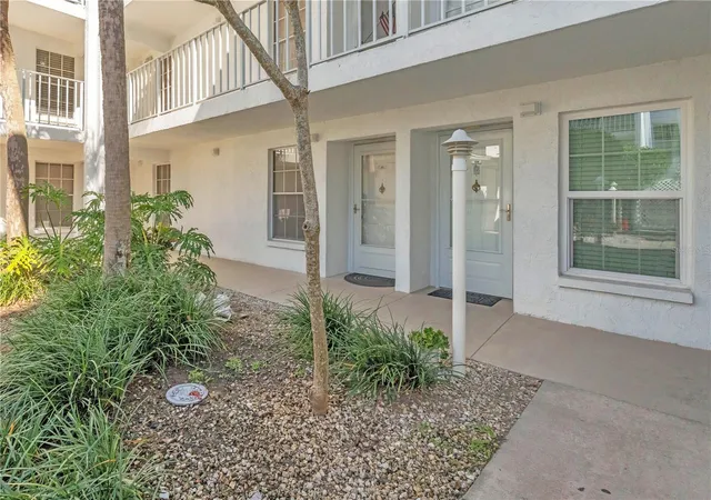 Listing Photo 1 - Condo for sale in building located at 6304 Pointe W Blvd, Bradenton, FL 34209 - Unit #A107