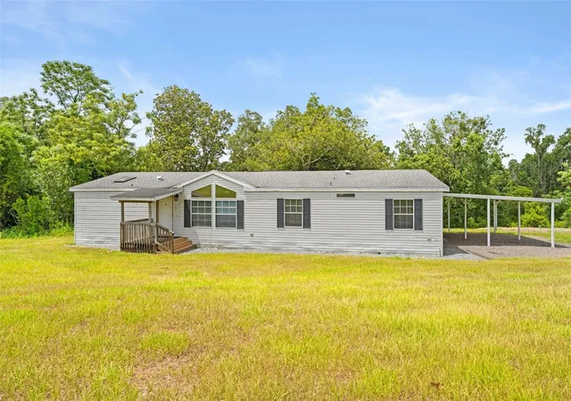 Photo 2 of Manufactured home for sale at 33320 Larkin Rd, Dade City, FL 33523 | MLS# W7887618 | Listing updated on 2026-08-18