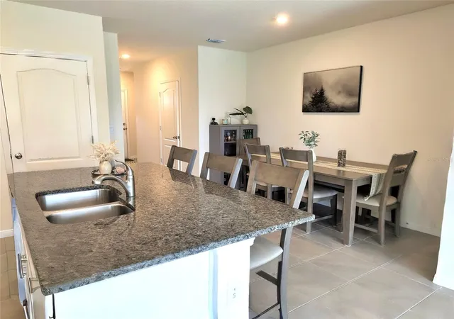 Photo 4 of Townhouse for sale at 60 Bella Lago Cir, Port Orange, FL 32129 | MLS# FC319994 | Listing updated on 2026-09-08