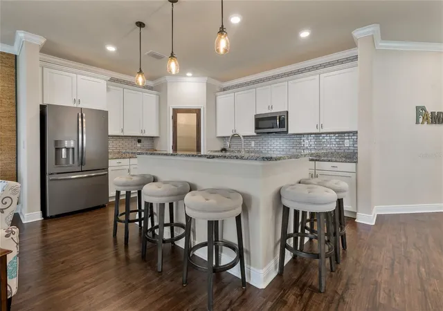 Photo 3 of Townhouse for sale at 597 Ozona Village Dr, Palm Harbor, FL 34683 | MLS# TB8529837 | Listing updated on 2026-08-22