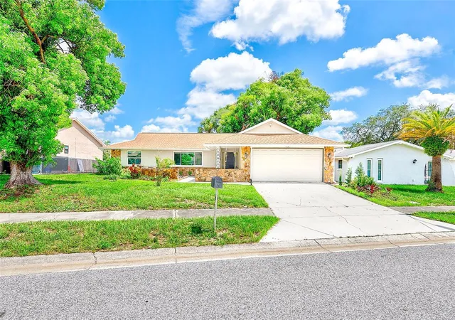 Photo 1 of Single family home for sale at 8741 Honeycomb Dr, Port Richey, FL 34668 | MLS# TB8529973 | Listing updated on 2026-09-01