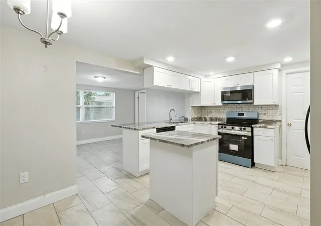 Photo 4 of Single family home for sale at 9239 Palm Ave, Port Richey, FL 34668 | MLS# TB8530587 | Listing updated on 2026-10-04
