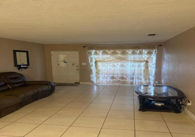 Photo 4 of Single family home for sale at 1827 Heather Ave, Tampa, FL 33612 | MLS# TB8530798 | Listing updated on 2026-10-30