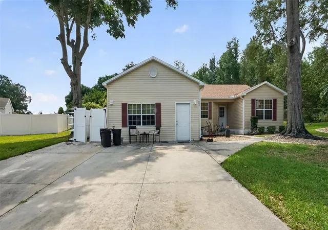 1st image of 706 Murray Cir, Lady Lake, FL 32159 | MLS# OM728841