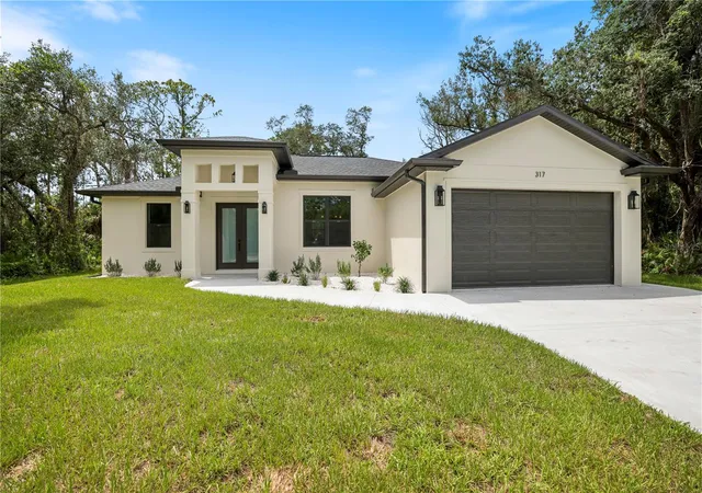 Photo 2 of Single family home for sale at 317 Dorman St, Port Charlotte, FL 33953 | MLS# A4700716 | Listing updated on 2026-08-20