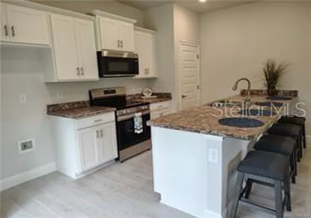 2nd image of 223 Bittern Loop #TH46, Inverness, FL 34453 | MLS# OM728982