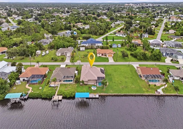 Photo 4 of Single family home for sale at 470 Spring Lake Blvd NW, Port Charlotte, FL 33952 | MLS# C7528699 | Listing updated on 2026-09-02