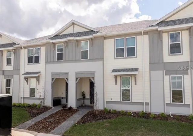 Photo 1 of Townhouse for sale at 1264 Blue Is Dr, Clermont, FL 34714 | MLS# O6427431 | Listing updated on 2026-10-05