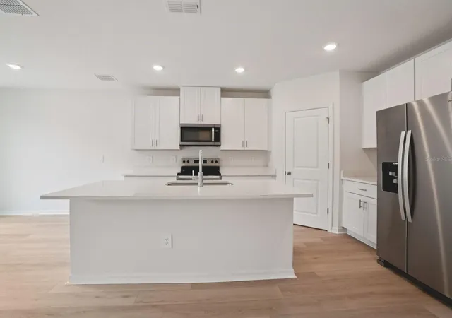 4th image of 3772 Moscato Dr, Brooksville, FL 34602 | MLS# TB8531988