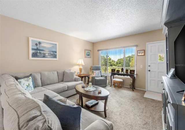 Photo 4 of Condo for sale at 2440 World Pkwy Blvd #52, Clearwater, FL 33763 | MLS# TB8532218 | Listing updated on 2026-09-23