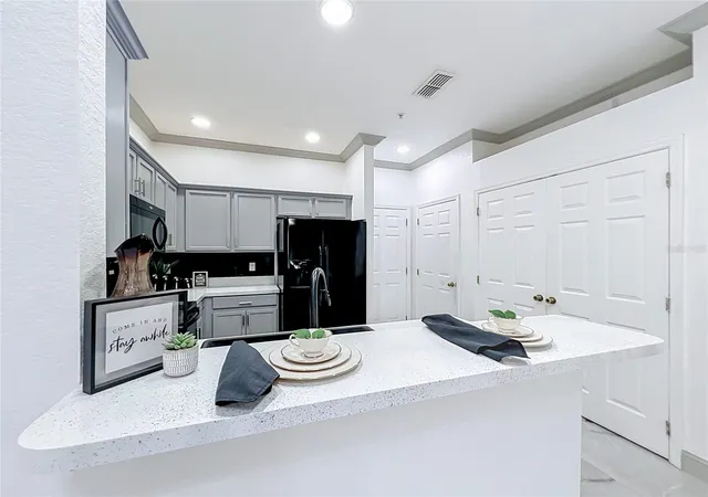 Photo 3 of Townhouse for sale at 14061 Turning Leaf Dr, Orlando, FL 32828 | MLS# O6427805 | Listing updated on 2026-09-04