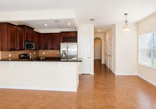 Photo 1 of Townhouse for sale at 1515 Bowmore Dr, Clearwater, FL 33755 | MLS# TB8532395 | Listing updated on 2026-08-27