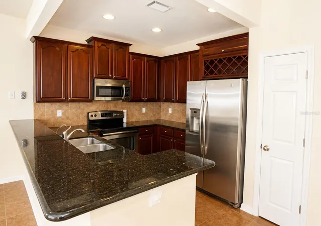 Photo 3 of Townhouse for sale at 1515 Bowmore Dr, Clearwater, FL 33755 | MLS# TB8532395 | Listing updated on 2026-08-27