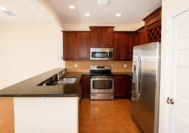 Photo 4 of Townhouse for sale at 1515 Bowmore Dr, Clearwater, FL 33755 | MLS# TB8532395 | Listing updated on 2026-08-27