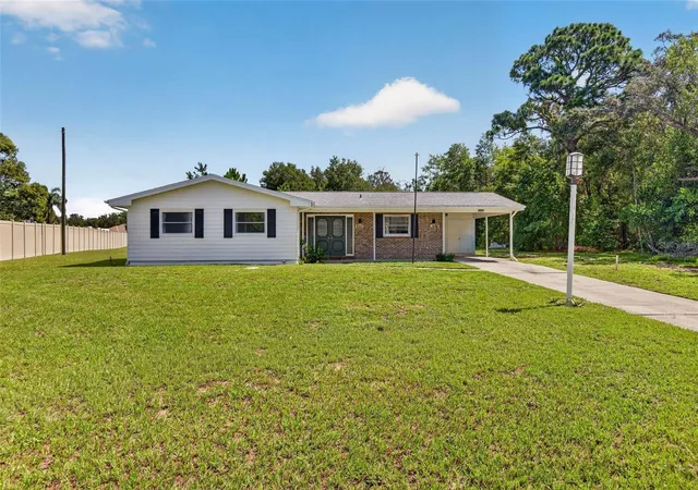 Photo 2 of Single family home for sale at 7502 Pond Cir, Spring Hill, FL 34606 | MLS# TB8532722 | Listing updated on 2026-09-02