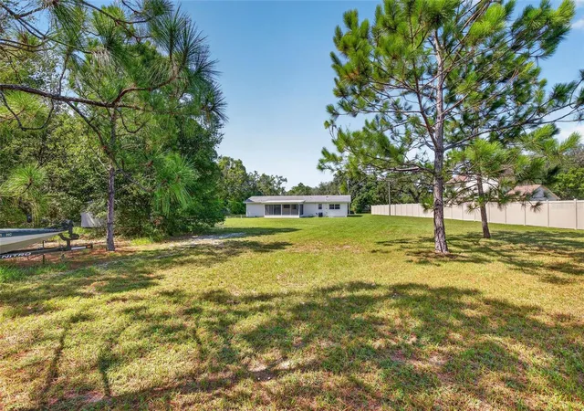 Photo 5 of Single family home for sale at 7502 Pond Cir, Spring Hill, FL 34606 | MLS# TB8532722 | Listing updated on 2026-09-02