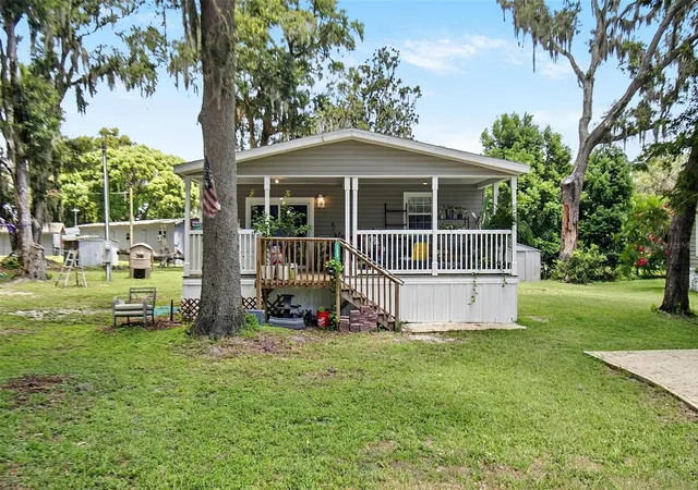 Photo 2 of Manufactured home for sale at 123 Magnolia Dr, Satsuma, FL 32189 | MLS# FC320195 | Listing updated on 2026-08-21