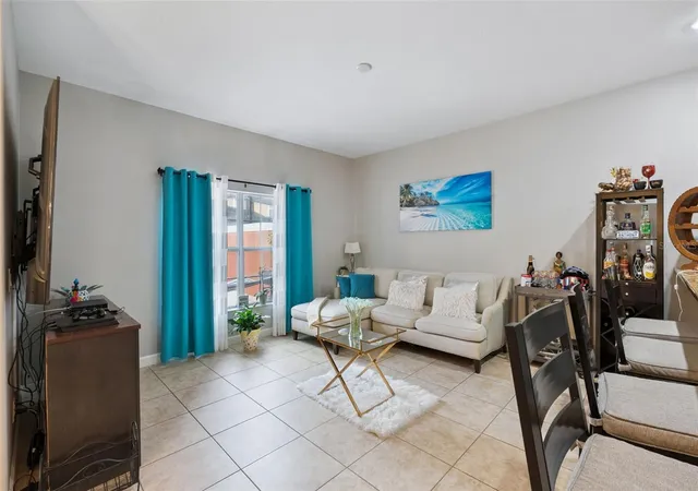 Photo 3 of Townhouse for sale at 8957 Cat Palm Rd, Kissimmee, FL 34747 | MLS# O6428364 | Listing updated on 2026-08-27