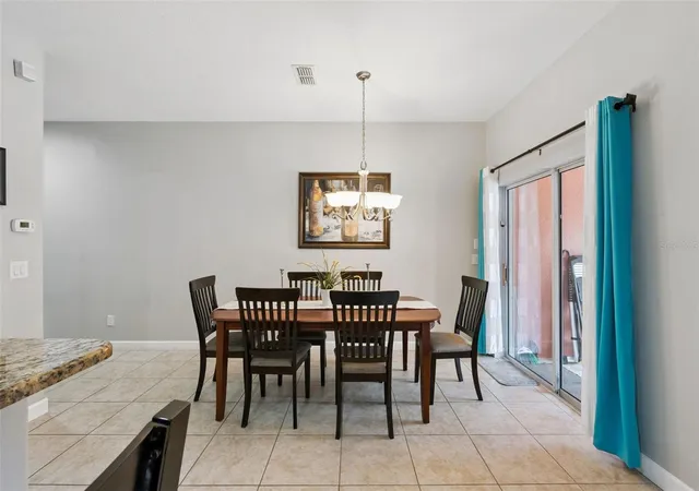 Photo 4 of Townhouse for sale at 8957 Cat Palm Rd, Kissimmee, FL 34747 | MLS# O6428364 | Listing updated on 2026-08-27