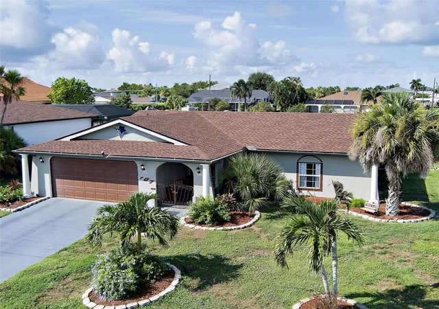 Photo 2 of Single family home for sale at 107 Peckham St Sw, Port Charlotte, FL 33952 | MLS# C7528869 | Listing updated on 2026-08-22