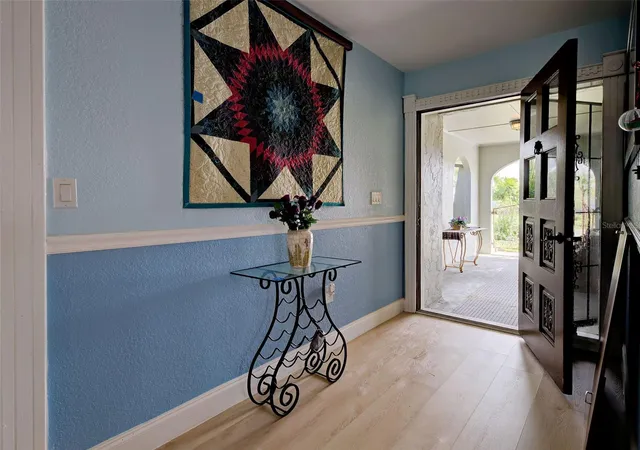 Photo 2 of Single family home for sale at 107 Peckham St SW, Port Charlotte, FL 33952 | MLS# C7528869 | Listing updated on 2026-08-22