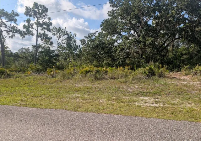 1st image of 809 Poinciana Dr, Indian Lake Estates, FL 33855 | MLS# P4939437
