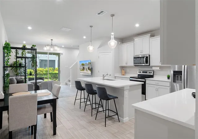 Photo 3 of Townhouse for sale at 31449 Woodland Race Loop, Wesley Chapel, FL 33545 | MLS# A4701360 | Listing updated on 2026-08-21