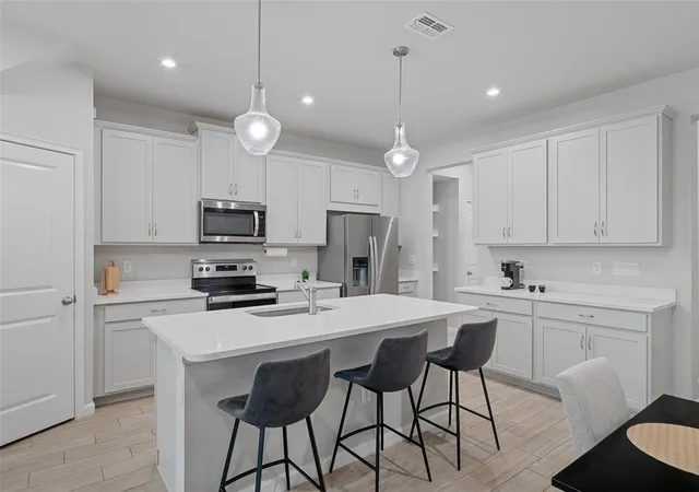 Photo 3 of Townhouse for sale at 31449 Woodland Race Loop, Wesley Chapel, FL 33545 | MLS# A4701360 | Listing updated on 2026-08-21