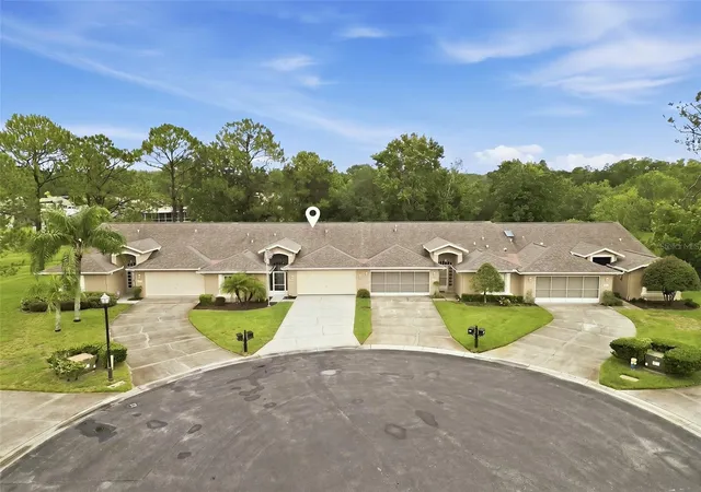 Photo 2 of Single family home for sale at 7411 Moorgate Ct, New Port Richey, FL 34654 | MLS# W7888065 | Listing updated on 2026-08-26