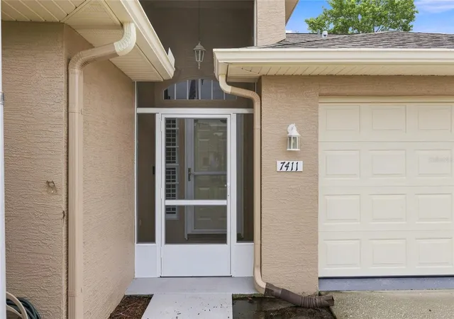 Photo 5 of House for sale at 7411 Moorgate Ct, New Port Richey, FL 34654 | MLS# W7888065 | Listing updated on 2026-08-26
