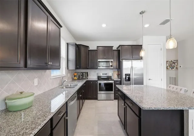 Photo 4 of Single family home for sale at 12929 Palapa Loop, Spring Hill, FL 34610 | MLS# W7888086 | Listing updated on 2026-09-01