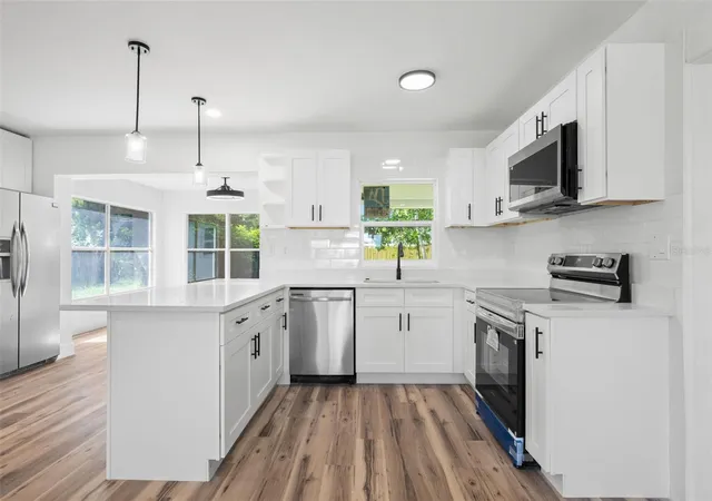 4th image of 6116 52Nd Ave N, Kenneth City, FL 33709 | MLS# TB8534042