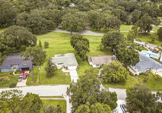 3rd image of 936 N Riverhills Dr, Temple Terrace, FL 33617 | MLS# TB8534173